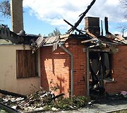 Sudegęs pastatas praėjus kelioms dienoms po gaisro