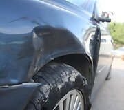 Pareigūno automobilis po avarijos