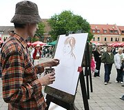 Penktadienį prasidėjusi &scaron;ventė &bdquo;Kauno dienos 2009&ldquo; ir antrąją dieną, &scaron;e&scaron;tadienį, kviečia nebijoti lietaus.