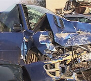 Sudaužytas policininko automobilis &bdquo;Subaru Impreza&ldquo;