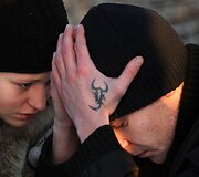 Permėje žmonės renkasi prie klubo, kuriame per gaisrą žuvo žmonės, &scaron;iame mieste vyksta ir žuvusiųjų laidotuvės.