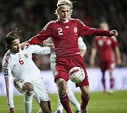 Paskutinėse 1-osios atrankos grupės rungtynėse jau anksčiau bilietus į pasaulio čempionatą užsitikrinę danai (raud. apr.) namuose pralaimėjo vengrams