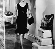 Kadras i&scaron; filmo &bdquo;Pusryčiai pas Tinanį&ldquo; (&bdquo;Breakfast at Tiffany's&ldquo;)