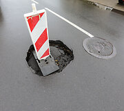 Duobės Kapsų gatvėje