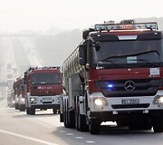 Lenkijos ugniagesių ma&scaron;inų kolona