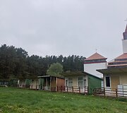 Mediniai nameliai &Scaron;ventosios bažnyčios pa&scaron;onėje 