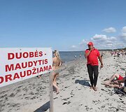 Įspėjamieji ženklai pajūryje 