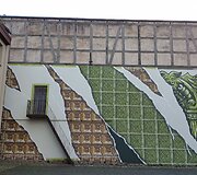 Diogo Machado kūrinys ant Klaipėdos Parodų rūmų sienos.