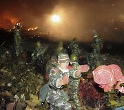 Kinijos ugniagesiai su gaisru kovojo visą parą