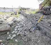 Vilniaus lenkų skautai ardo tvorą i&scaron; antkapių