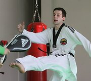Taekwondo kovotojas Vitoldas Dzikevičius treniruotėje