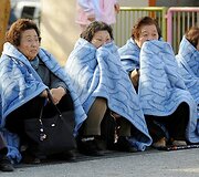 Tragedijos sukrėsti Japonijos gyventojai