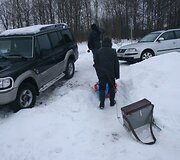 Nusivylę žvejai grįžta į krantą.