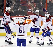 &bdquo;Canadiens&ldquo; ledo ritulininkai džiaugiasi įvarčiu.