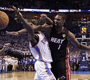 Serge Ibaka ir Chrisas Boshas