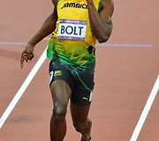 Jamaikietis Usainas Boltas laimėjo aukso medalius 100 m ir 200 m bėgimo rungtyse