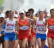 Kinietis Dingas Chenas (centre) i&scaron;kovojo aukso medalį 20 km greitjojo ėjimo rungtyje