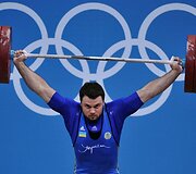 Sunkumų kilnotojas Oleksiy Torokhtiy i&scaron; Ukrainos