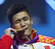 Sunkumų kilnotojas Xiaojunas Lu i&scaron; Kinijos