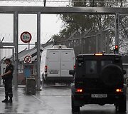 Į Ilos kalėjimą vežamas Andersas Behringas Breivikas