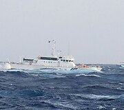 Taivano žvejų laivų apsuptas Japonijos pakrančių sargybos laivas