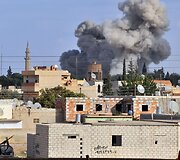 Bombarduojamas Ras al Aino miestas