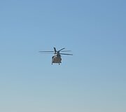 ISAF sraigtasprnis atvyksta paimti delegacijos grįžimui į Čagčaraną. 