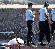 Policininkai prie žuvusio bangletininko kūno
