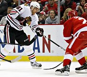 Marianas Hossa ir Brendanas Smithas