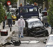 Tyrėjai sprogimo vietoje