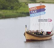 Protestuotojai su kaukėmis pana&scaron;iomis į G8 vadovus
