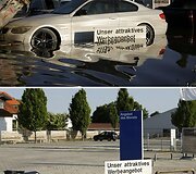 Automobilių stovėjimo aik&scaron;telė prie BMW parduotuvės Degendorfe 2013 m. birželio 8 d. (vir&scaron;uje) ir 2013 m. birželio 21 d. (apačioje)