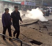 Sprogusio naftotiekio padariniai Čingdao mieste