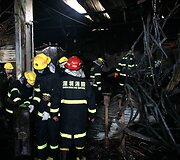 Gaisro nuniokotas prekybos centras Kinijoje