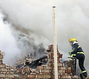 Kinijos batų fabrike kilo gaisras.