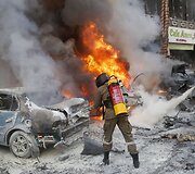 Užminuoto automobilio sprogimo padariniai Beirute