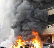 Užminuoto automobilio sprogimo padariniai Beirute