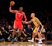 Dwightas Howardas ir Robertas Sacre