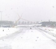 Lėktuvas apsnigtame Va&scaron;ingtono oro uoste