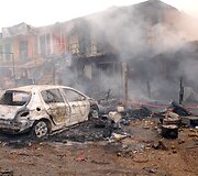 Sprogimo padariniai Džoso turgavietėje, Nigerijoje.