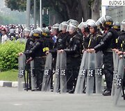 Riau&scaron;ių policija Vietname