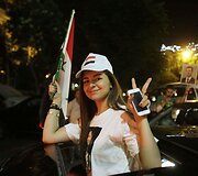 Damaske žmonės &scaron;ventė Basharo al Assado pergalę Sirijos prezidento rinkimuose.