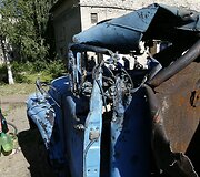 Slovjanske artilerijos sviedino apgadintas sunkvežimis