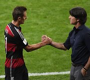 Miroslavas Klose ir Vokietijos futbolo rinktinės treneris Joachimas Loewas