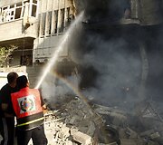 Izraelio oro atakų padariniai Gazos mieste