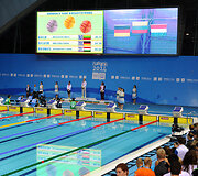 Rūta Meilutytė ant nugalėtojų pakylos