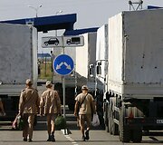 Rusijos &bdquo;humanitarinės pagalbos&ldquo; sunkvežimiai prie Ukrainos sienos