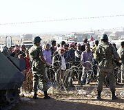 Sirijos kurdų pabėgėliai plūsta į Turkiją.