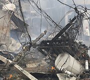 Filipinuose per gaisrą sudegė daugiau kaip 200 namų.