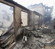 Filipinuose per gaisrą sudegė daugiau kaip 200 namų.